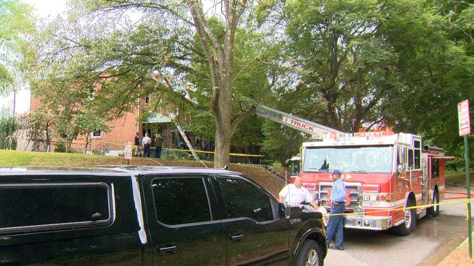 Woman pulled from house fire in west Baltimore dies