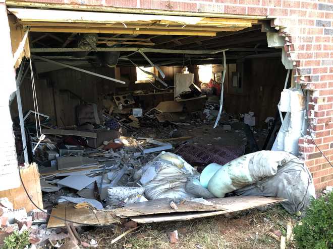 Seneca woman killed when car slams into home during chase, coroner says