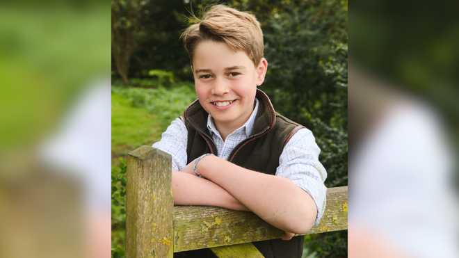 The new picture was posted by Prince George's proud parents on their official social media platforms.