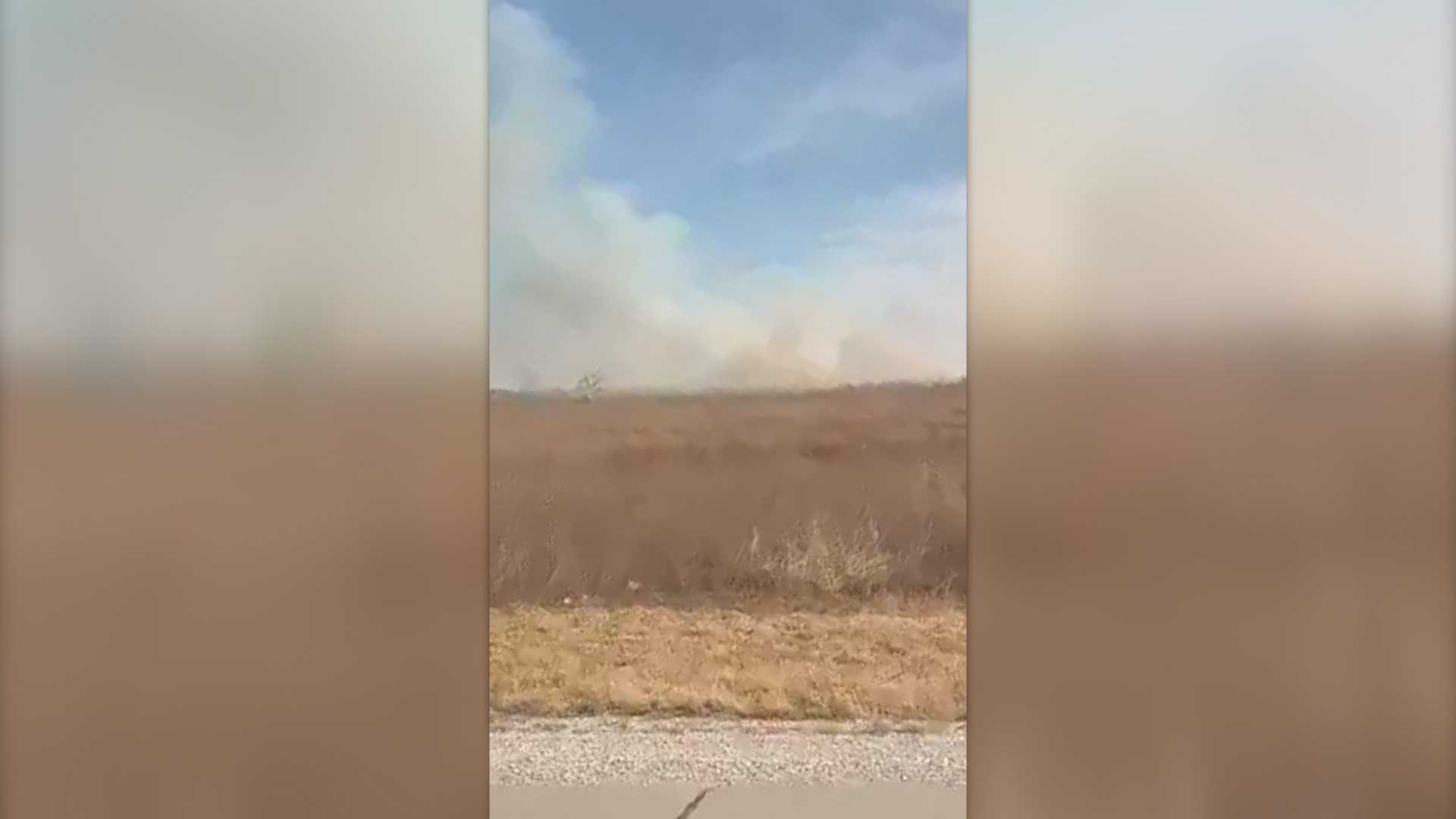 Multiple fire crews battling brush fire along I-29 near Nebraska City