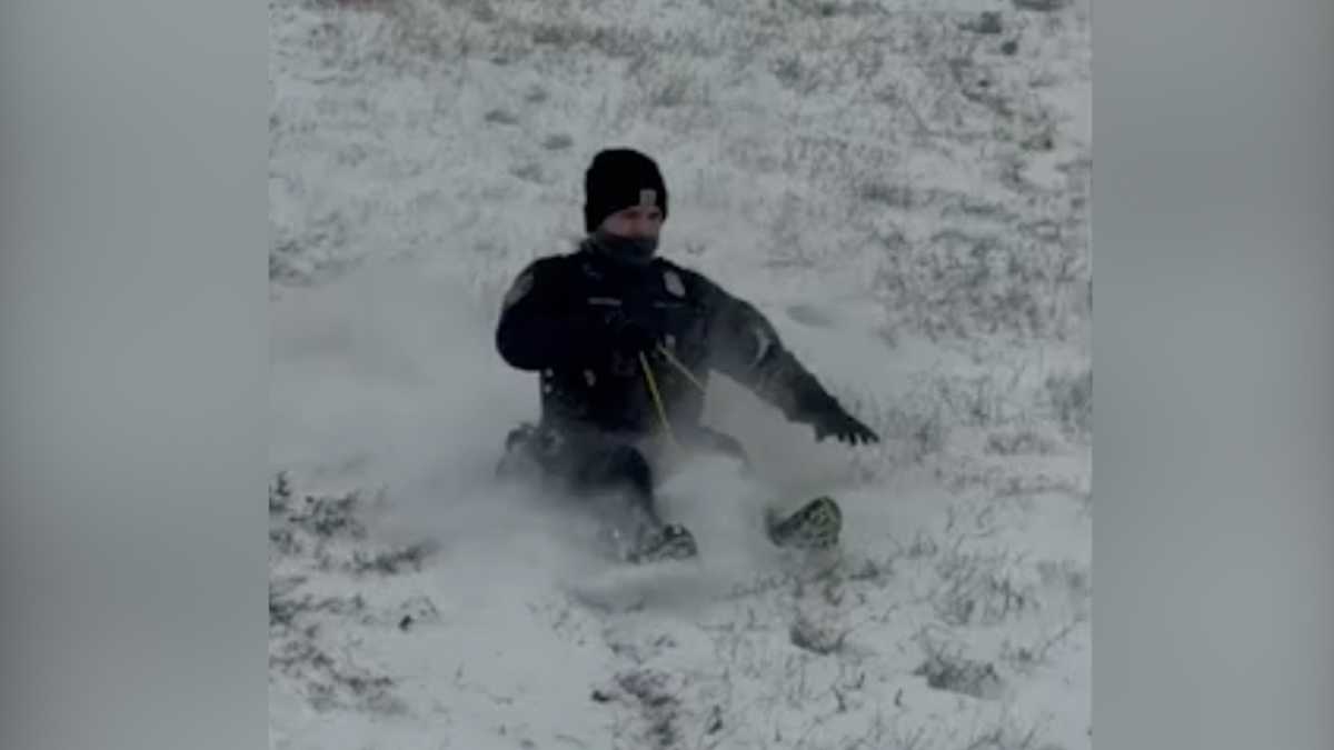Police officers grab sleds and join Oklahoma children for snow day fun