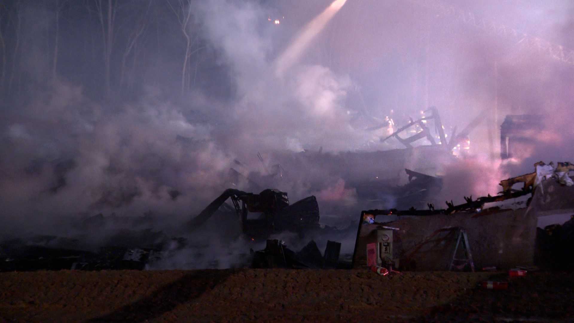 Massive fire leaves unfinished apartment building in ashes - WYFF