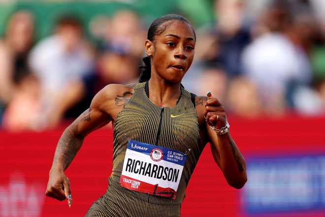 EUGENE,&#x20;OREGON&#x20;-&#x20;JUNE&#x20;27&#x3A;&#x20;Sha&amp;apos&#x3B;Carri&#x20;Richardson&#x20;competes&#x20;in&#x20;the&#x20;first&#x20;round&#x20;of&#x20;the&#x20;women&amp;apos&#x3B;s&#x20;200&#x20;meters&#x20;on&#x20;Day&#x20;Seven&#x20;of&#x20;the&#x20;2024&#x20;U.S.&#x20;Olympic&#x20;Team&#x20;Track&#x20;&amp;amp&#x3B;&#x20;Field&#x20;Trials&#x20;at&#x20;Hayward&#x20;Field&#x20;on&#x20;June&#x20;27,&#x20;2024&#x20;in&#x20;Eugene,&#x20;Oregon.&#x20;&#x28;Photo&#x20;by&#x20;Patrick&#x20;Smith&#x2F;Getty&#x20;Images&#x29;