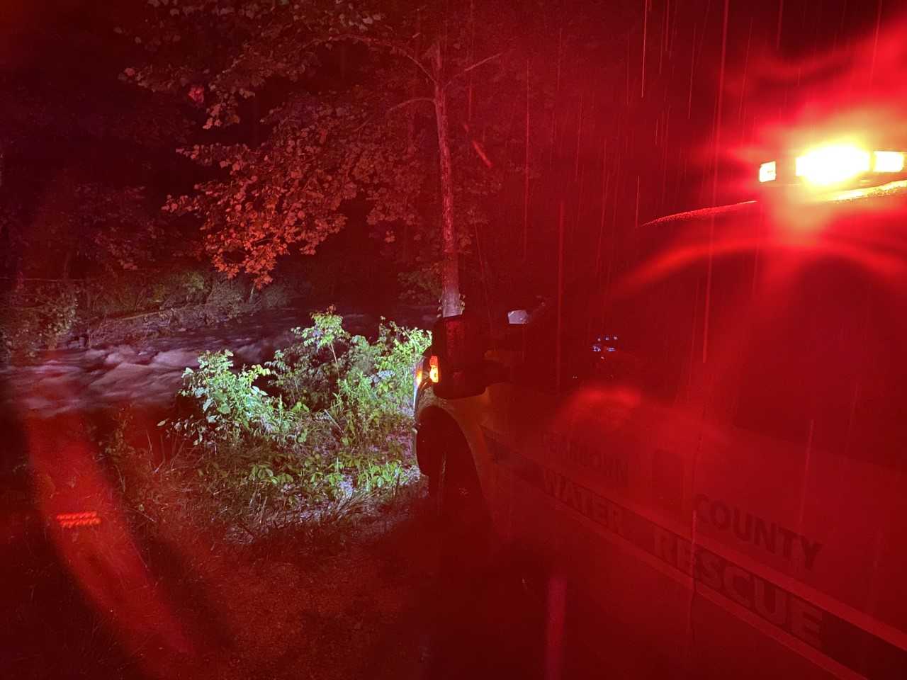 Four rescued as flood waters sweep truck down creek in Guilford