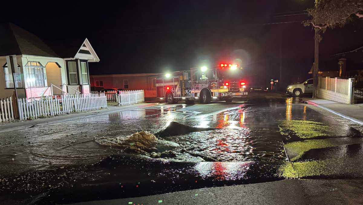 Sinkhole caused by water main break in California forces street closure