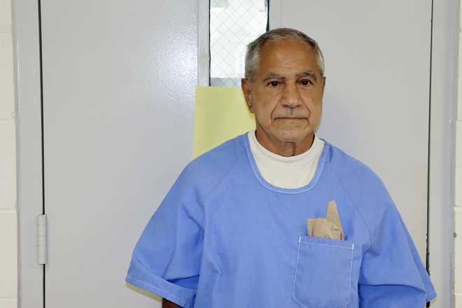 In this image provided by the California Department of Corrections and Rehabilitation, Sirhan Sirhan arrives for a parole hearing Friday, Aug. 27, 2021, in San Diego. Sirhan faces his 16th parole hearing Friday for fatally shooting U.S. Sen. Robert F. Kennedy in 1968.