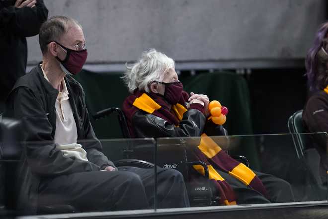 Sister&#x20;Jean&#x20;Dolores&#x20;Schmidt&#x20;watches&#x20;Loyola&#x20;Chicago&#x20;play&#x20;Illinois&#x20;during&#x20;the&#x20;first&#x20;half&#x20;of&#x20;a&#x20;men&#x27;s&#x20;college&#x20;basketball&#x20;game&#x20;in&#x20;the&#x20;second&#x20;round&#x20;of&#x20;the&#x20;NCAA&#x20;tournament&#x20;at&#x20;Bankers&#x20;Life&#x20;Fieldhouse&#x20;in&#x20;Indianapolis,&#x20;Sunday,&#x20;March&#x20;21,&#x20;2021.