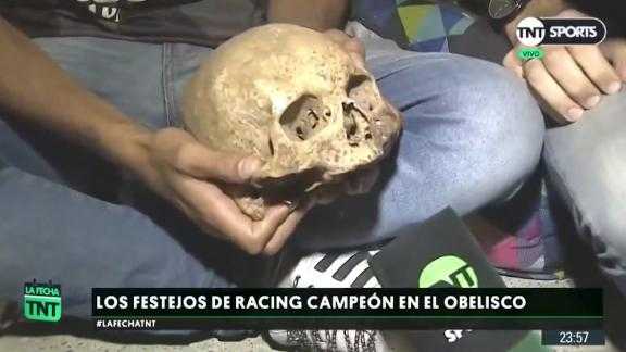 A fan of Argentine football club Racing dug up his grandfather's skull to celebrate winning the league title.