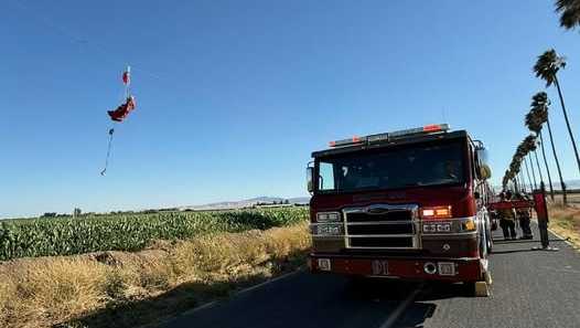 Skydiver rescued after being entangled in Tracy power lines, causing outage