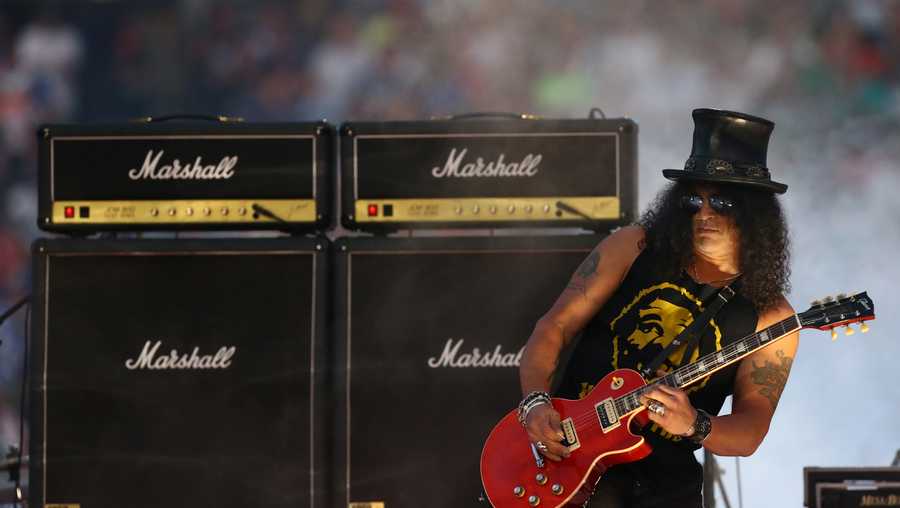 Slash plays before the Rabbitohs and Bulldogs game in the NRL Grand Final at ANZ Stadium 2014. Sydney, Australia. Sunday 5th October 2014. (Photo: Steve Christo) (Photo by Steve  Christo/Corbis via Getty Images)