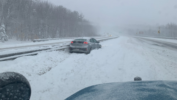 Heavy snow brings treacherous travel, slide offs