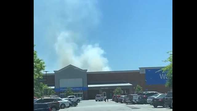 Trash fire behind Walmart sends plume of smoke over area - Vimarsana News
