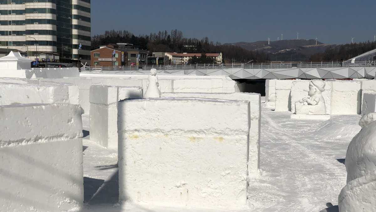 Chainsaw artists create incredible snow sculptures for visitors to the ...