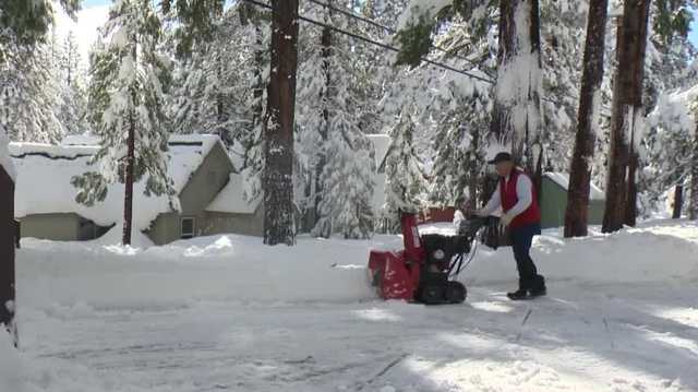 Residents clear snow after piles of it from weekend storms - Vimarsana News