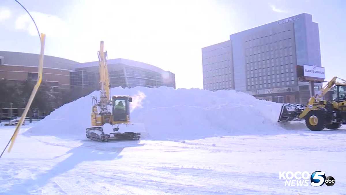 OKLAHOMA WINTER STORM Massive snow pile in downtown OKC as crews work
