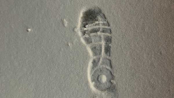 A footprint in the fresh fallen snow is shown. The Lee's Summit Police Department said a burglary suspect left this trail of footprints behind after allegedly breaking into a business and stealing vapes.