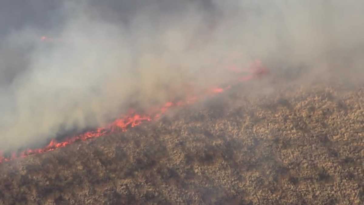 Crews battle grass fire in Solano County