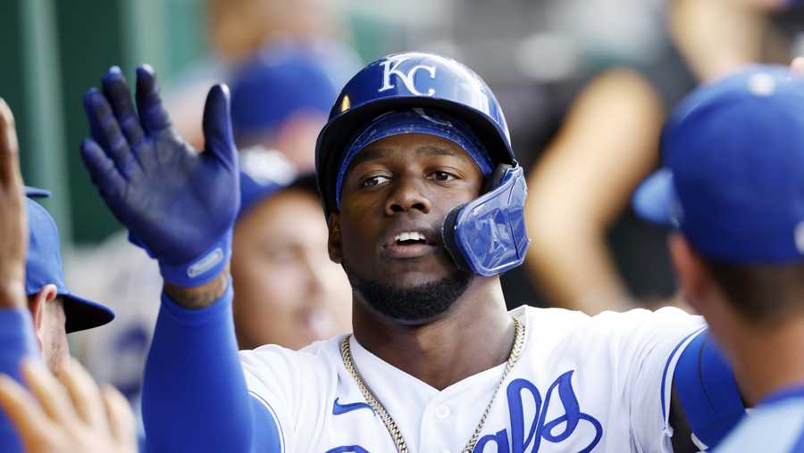 Kansas City Royals' Jorge Soler celebrates in the dugout after hitting a solo home run in the fourth inning of a baseball game against the Chicago White Sox at Kauffman Stadium in Kansas City, Mo., Monday, July 26, 2021. (AP Photo/Colin E. Braley)