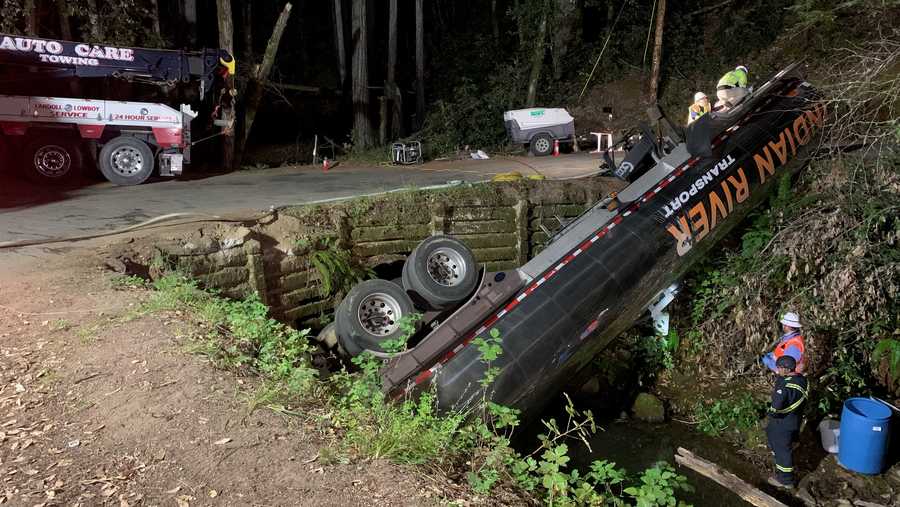 a truck carrying apple juice concentrate crashes into soquel creek