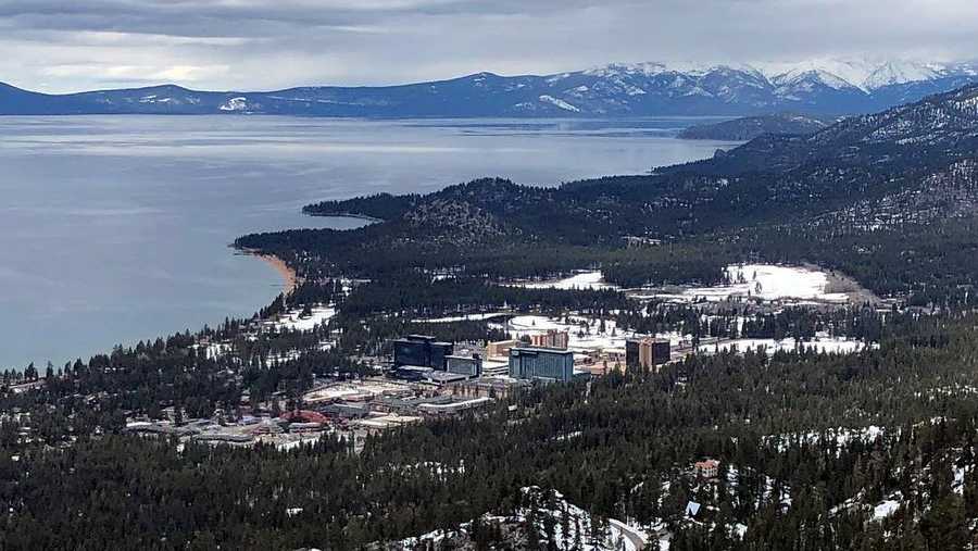 An aerial photo of Lake Tahoe and nearby towns of South Lake Tahoe, California and Stateline, Nevada