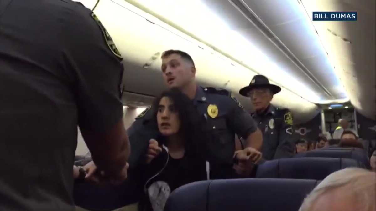 Southwest Airlines apologizes to woman dragged off plane