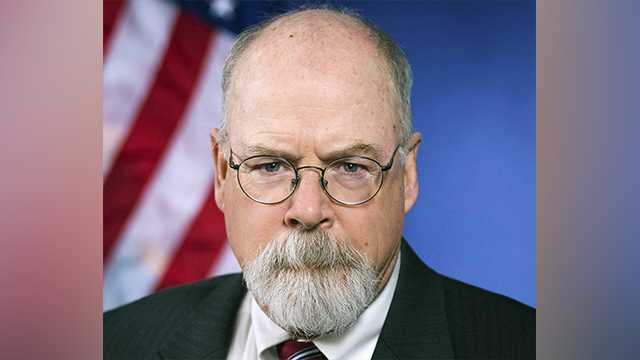 This 2018 portrait released by the U.S. Department of Justice shows Connecticut's U.S. Attorney John Durham. Attorney General William Barr has given extra protection to the prosecutor he appointed to investigate the origins of the Russia investigation, giving him the authority of a special counsel to allow him to complete his work without being easily fired.