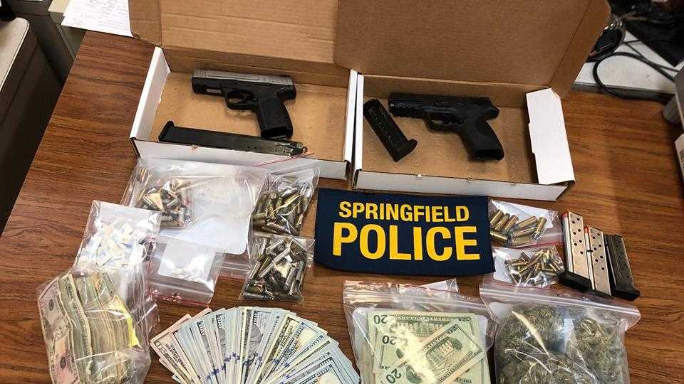 Loaded firearm seized in Springfield, two arrested