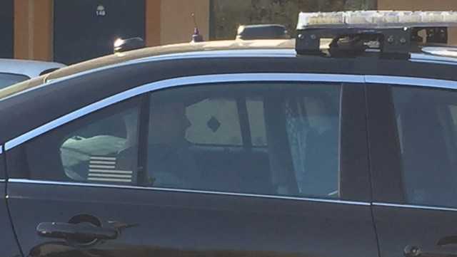 Man in custody after barricading himself in hotel, police say