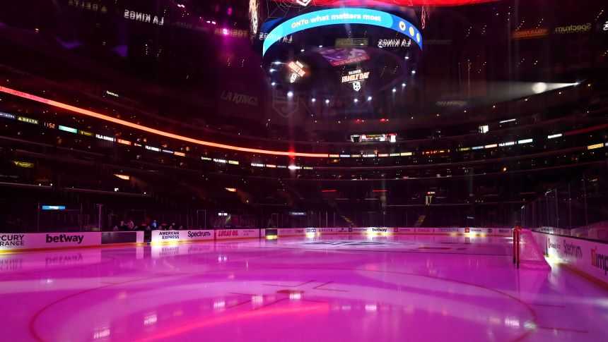 The ice at Staples Center is illuminated before an NHL hockey game between the Los Angeles Kings and the Buffalo Sabres, Sunday, Oct. 31, 2021, in Los Angeles. (AP Photo/Jayne Kamin-Oncea)