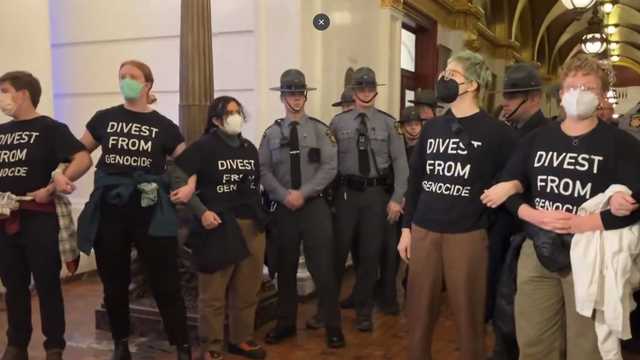 Troopers handcuff some protesters who entered Pa. Capitol - Vimarsana News