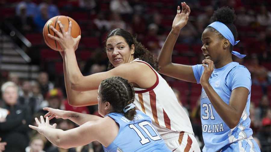 iowa state center stephanie soares looks to pass away from north carolina forward anya poole, right, and guard eva hodgson during the first half of an ncaa college basketball game in the phil knight invitational in portland, ore., sunday, nov. 27, 2022. (ap photo/craig mitchelldyer)