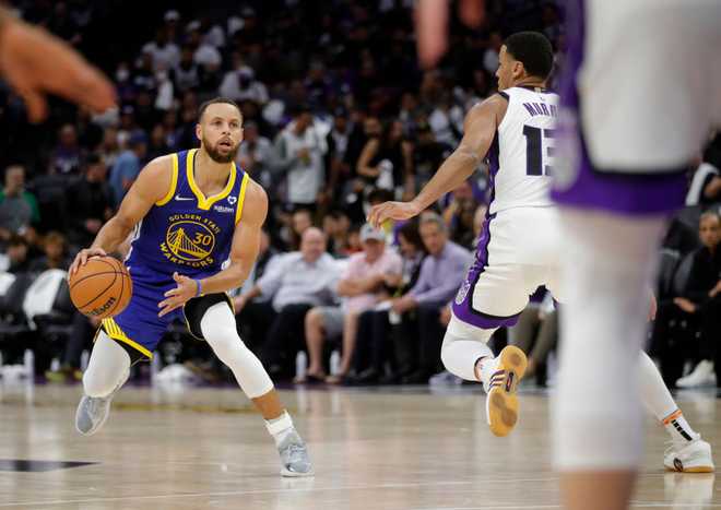 SACRAMENTO,&#x20;CALIFORNIA&#x20;-&#x20;APRIL&#x20;16&#x3A;&#x20;Golden&#x20;State&#x20;Warriors&#x27;&#x20;Stephen&#x20;Curry&#x20;&#x23;30&#x20;weaves&#x20;his&#x20;way&#x20;though&#x20;Sacramento&#x20;Kings&#x20;defense&#x20;in&#x20;the&#x20;third&#x20;quarter&#x20;of&#x20;their&#x20;NBA&#x20;play-in&#x20;tournament&#x20;game&#x20;at&#x20;the&#x20;Golden&#x20;One&#x20;Center&#x20;in&#x20;Sacramento,&#x20;Calif.,&#x20;on&#x20;Tuesday,&#x20;April&#x20;16,&#x20;2023.&#x20;&#x28;Jane&#x20;Tyska&#x2F;Digital&#x20;First&#x20;Media&#x2F;East&#x20;Bay&#x20;Times&#x20;via&#x20;Getty&#x20;Images&#x29;