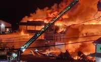 A huge fire ripped through a vacant furniture factory in Stewartstown, York County, early Saturday morning.