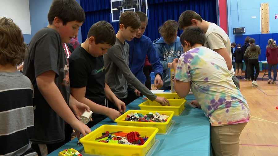 students make lego cars at stem festival