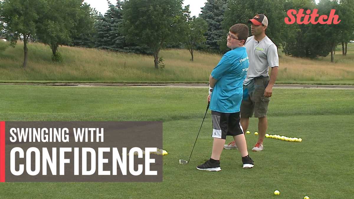 Golf pros give lessons to people with visual impairments
