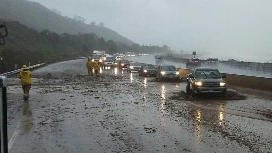 Torrential downpours were hitting Southern California on Friday, while northern parts of the state brace for the impact of more rain on Oroville Dam's damaged spillway early next week. Lanes are closed due to heavy rain and mud at Seacliff exit on the Pacific Coast Highway.