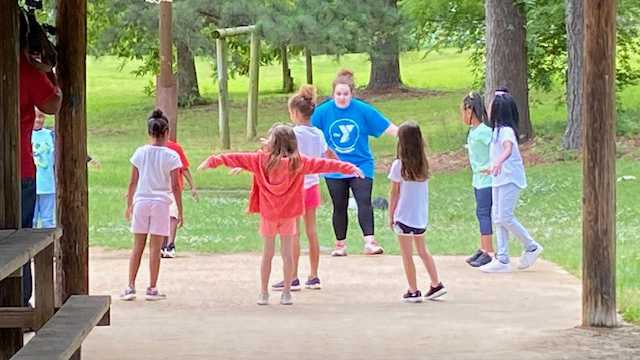 Summer camps teach kids about social distancing