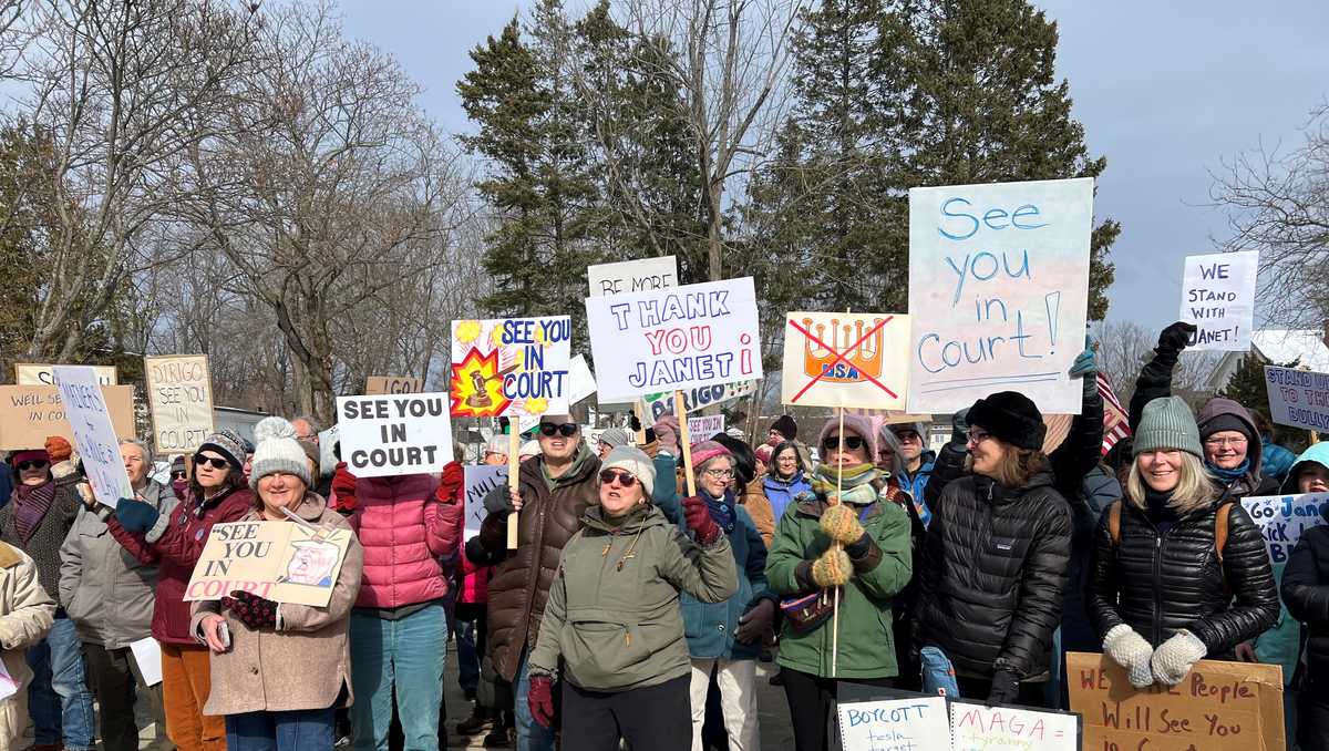 Dozens rally behind Gov. Mills at state house following exchange with ...