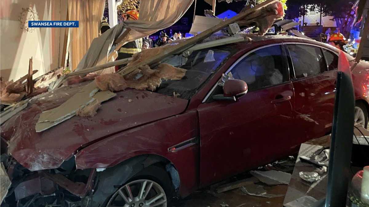 2 people taken to hospital after car crashes into Mass. home