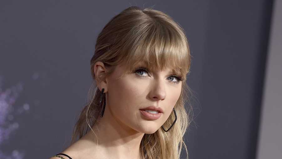 This Nov. 24, 2019 file photo shows Taylor Swift at the American Music Awards in Los Angeles. A Texas man is sentenced to 30 months in prison after pleading guilty to stalking and sending threatening letters about Swift. A federal judge in Nashville, Tennessee handed down the sentence Wednesday to Eric Swarbrick, who sent over 40 letters and emails to Swift's former record label in 2018, asking the CEO to introduce him to Swift. Over time the letters became more violent and threatening.