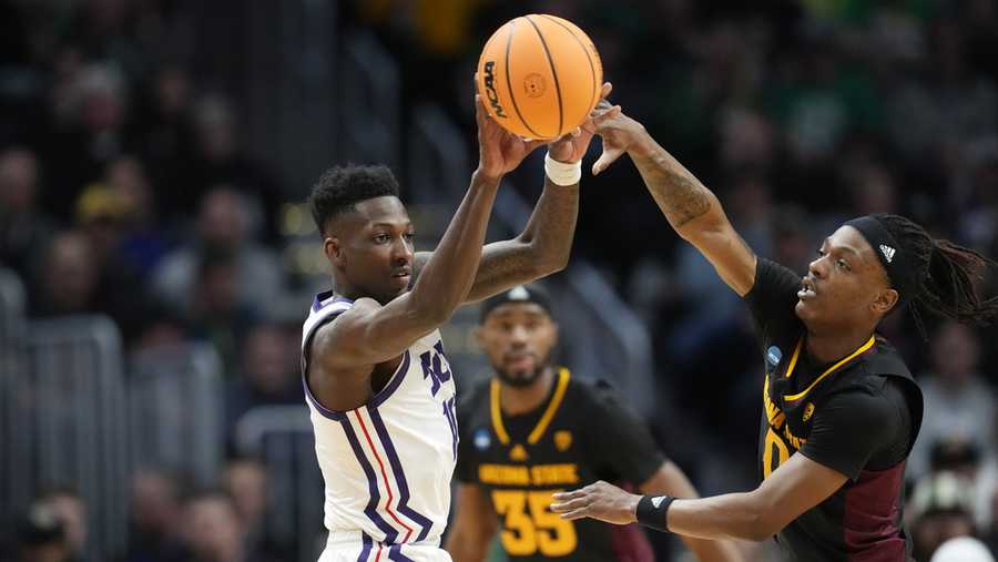 TCU basketball TCU guard Damion Baugh, left, passes the ball as Arizona State guard DJ Horne defends in the first half of a first-round college basketball game in the men's NCAA Tournament, Friday, March 17, 2023, in Denver.