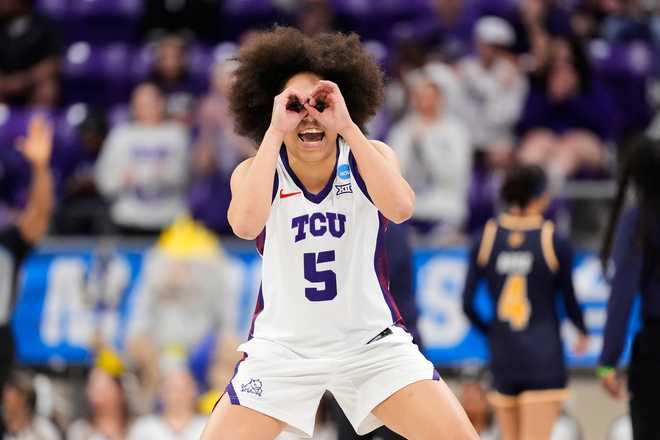 TCU guard Olivia Miles celebrates in the first half in the first round of the NCAA college basketball tournament against UC San Diego, Friday, March 20, 2026, in Fort Worth, Texas.