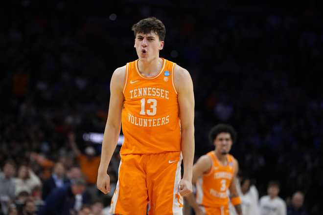 Tennessee&amp;apos;s J.P. Estrella reacts after a basket during the second half against Virginia in the second round of the NCAA college basketball tournament, Sunday, March 22, 2026, in Philadelphia.