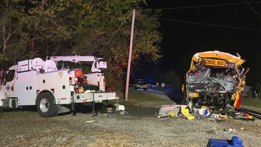 This photo provided by the Tennessee Highway Patrol shows the scene of deadly crash involving a utility vehicle and a school bus carrying children on Tuesday evening, Oct. 27, 2020, in Decatur, Tenn. (Tennessee Highway Patrol via AP)