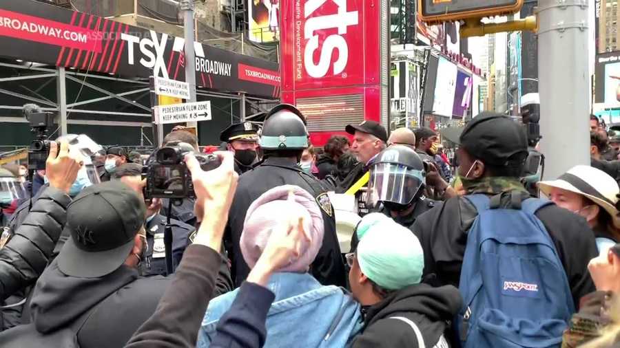 Trump supporters and protesters clash in New York on Oct. 25, 2020.