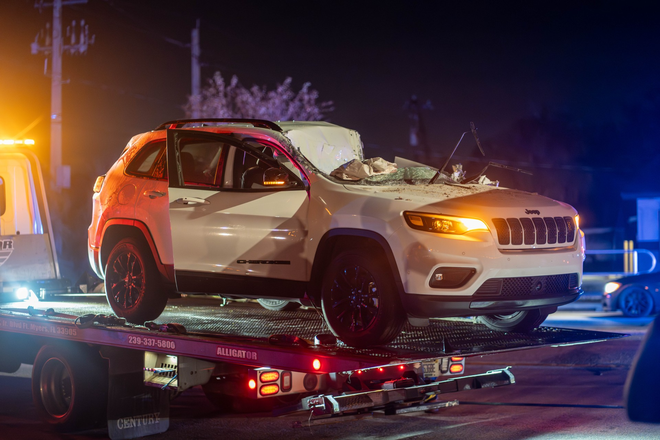 Roads blocked after SUV crashes with semi-truck in Fort Myers.