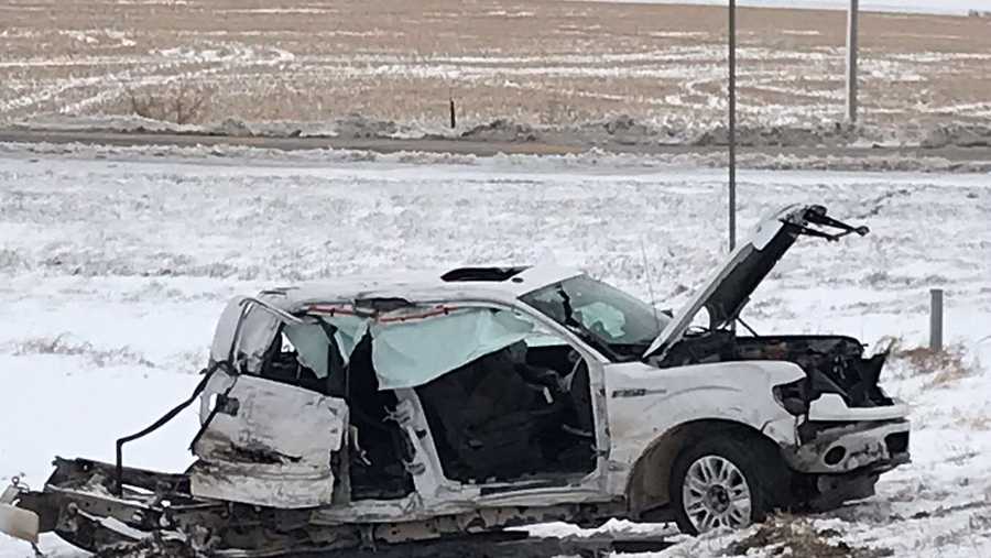 Pickup truck split in half after colliding with semi carrying 80,000