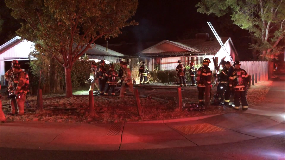 Woman rescued from Sacramento house fire