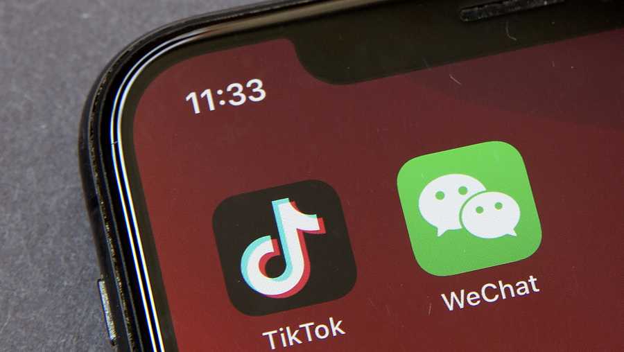 Icons for the smartphone apps TikTok and WeChat are seen on a smartphone screen in Beijing, in a Friday, Aug. 7, 2020 file photo.