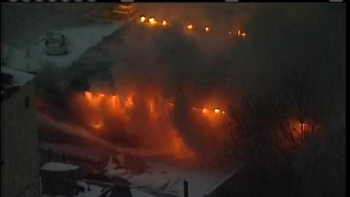 Firefighters battle massive fire at tire recycling plant